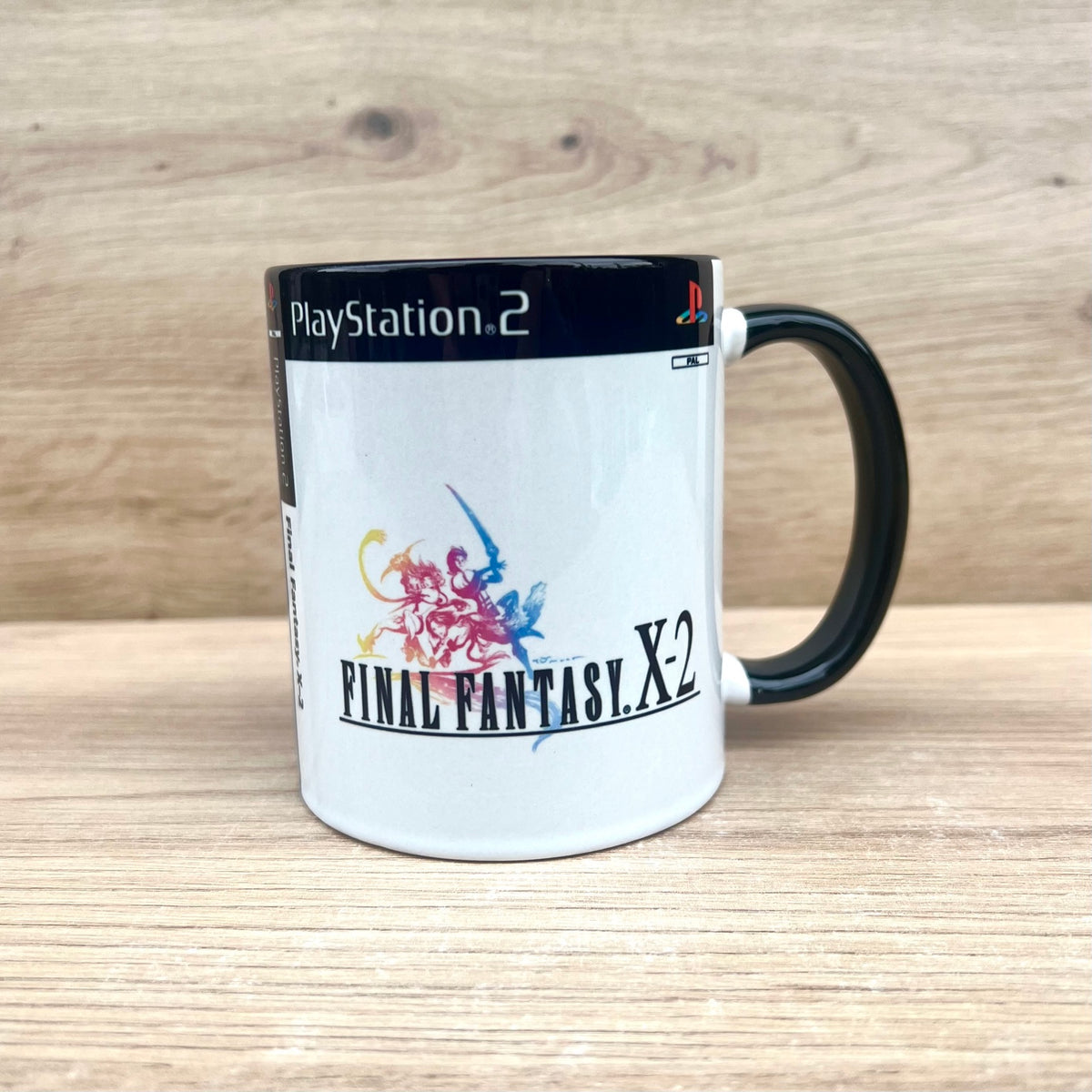 Final Fantasy X-2 PS2 - taza frontal